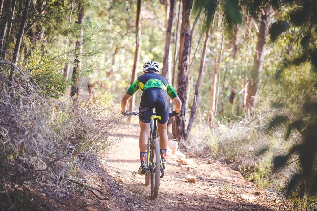 Mountain Biker in a Trail